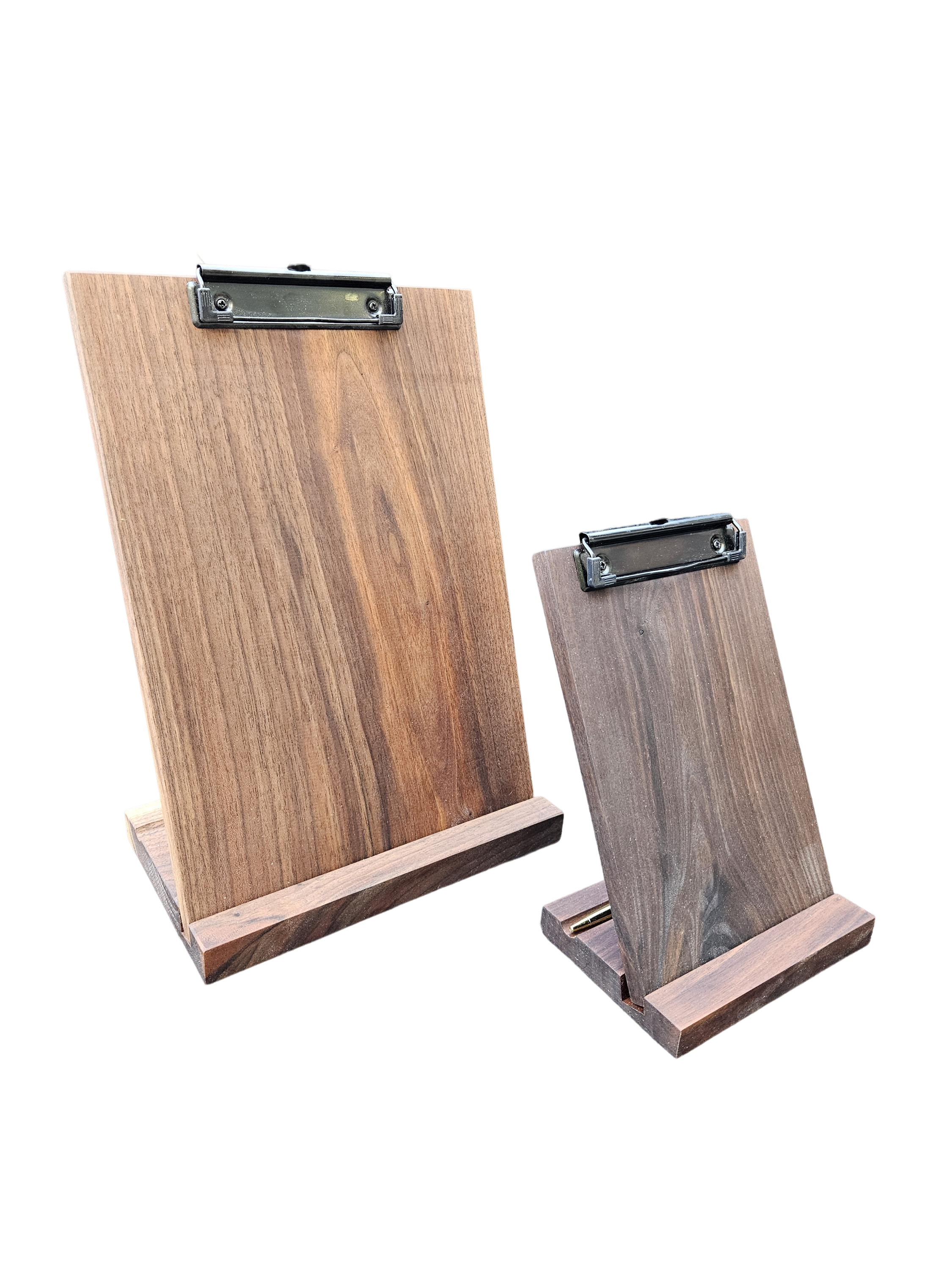 a wooden clipboard and a wooden clipboard on a black background