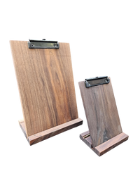 a wooden clipboard and a wooden clipboard on a black background